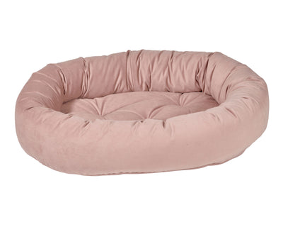 Donut Bed with oval bolster and tufted cushion in Rosewood.